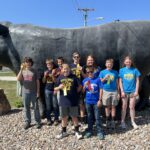 Front: Will Stout, Hunter Lange. Back: Bensen Rohwer, Logan Dau, Austin Negus, Brett Evans, MaKenna Wallin, Eliot Boardman, BreLee Rasmussen.